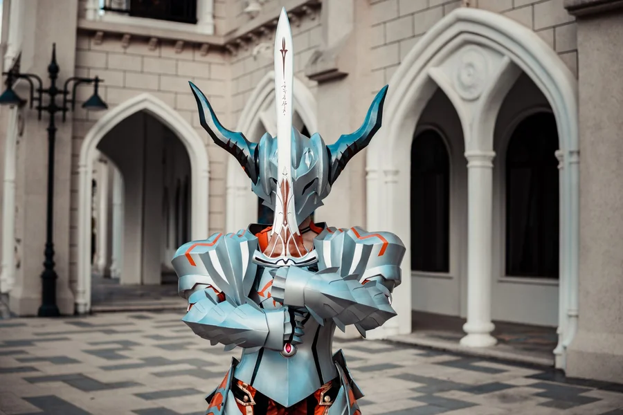 fantasy knight in dragon themed silver armor standing in royal castle courtyard