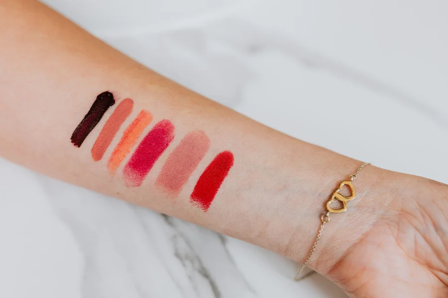makeup swatches on skin arm background
